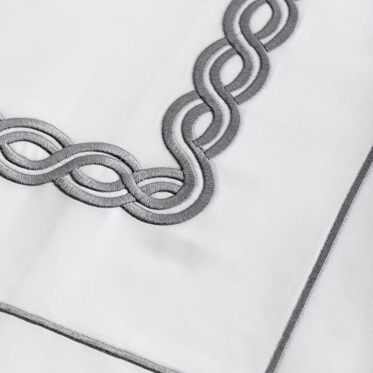 chain-custom-embroidery-hospitality-hotel-sheets-bedding.jpg