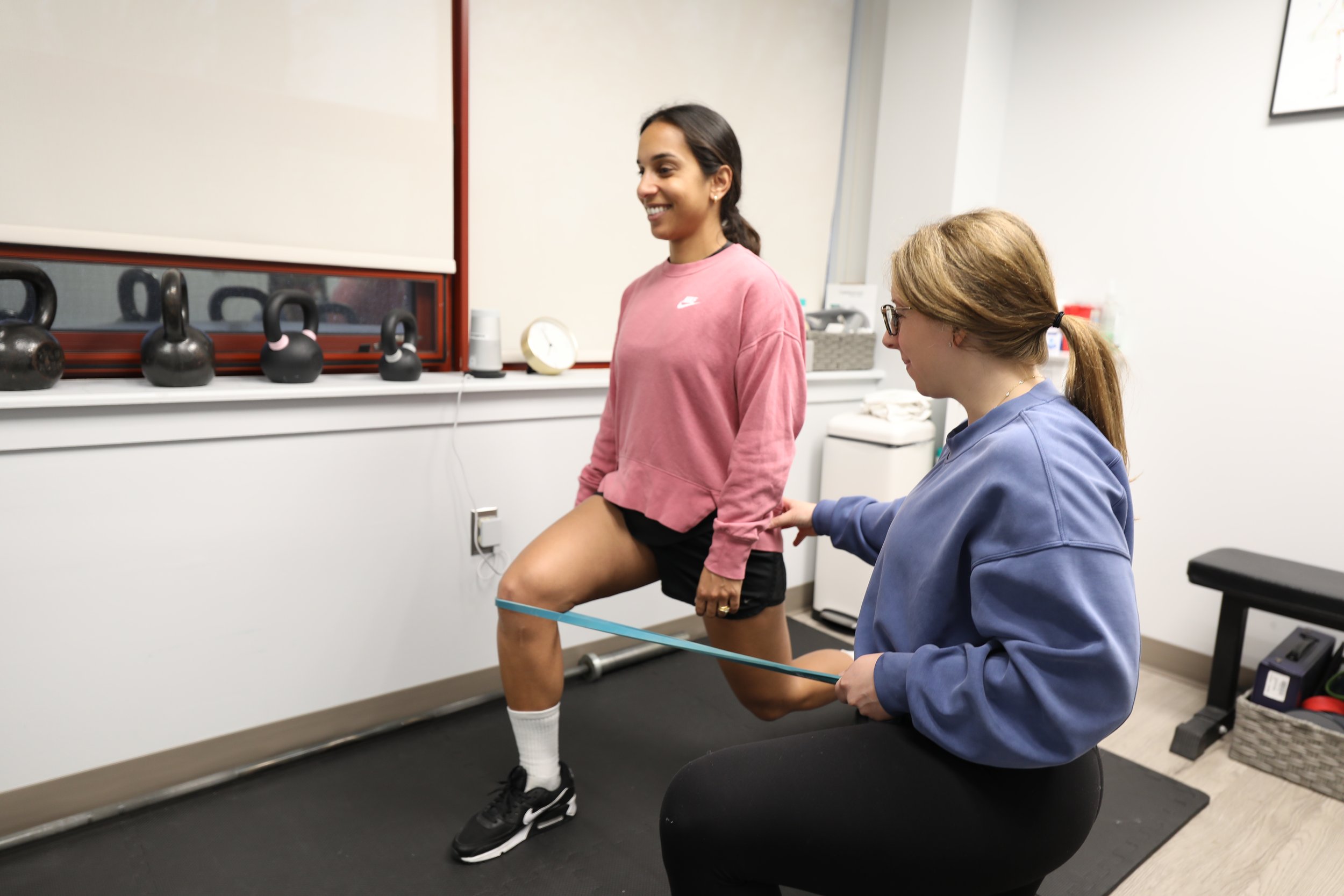 CoreMovement Physical Therapy treatment room in Bryn Mawr showing modern equipment and welcoming one-on-one care environment