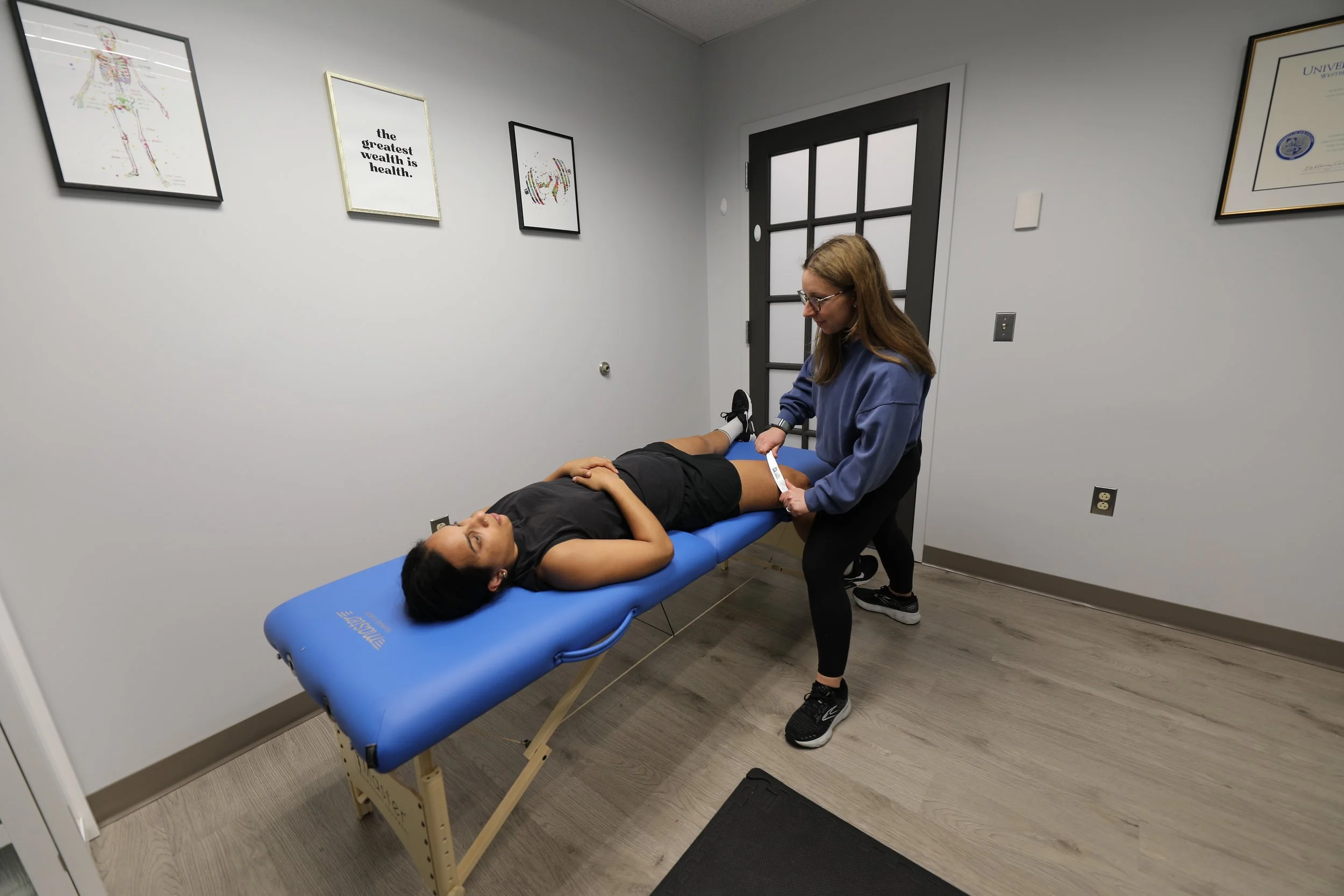 Active patient demonstrating full range of motion after successful physical therapy treatment for sports injury at CoreMovement in Bryn Mawr