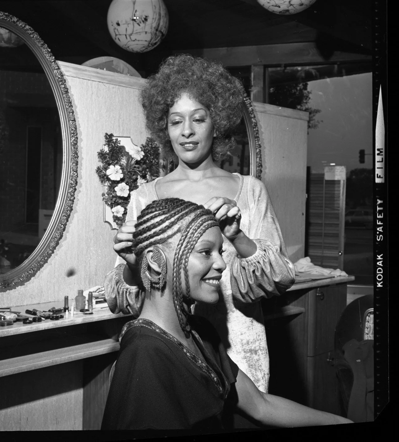 Cleo H. Jackson preparing a client’s hair at Cleo’s Beauty Circle, Los Angeles (1960s)