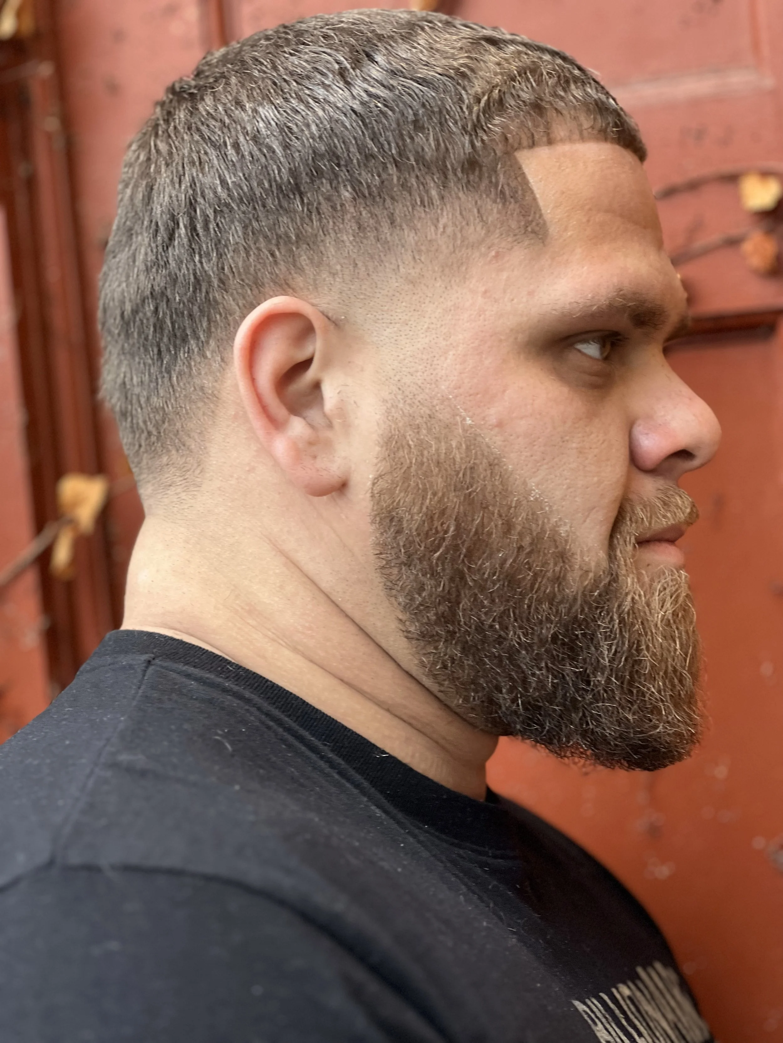Sleek and refined modern men's haircut