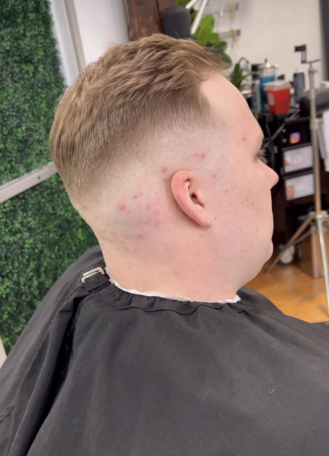 Sleek and refined modern men's haircut