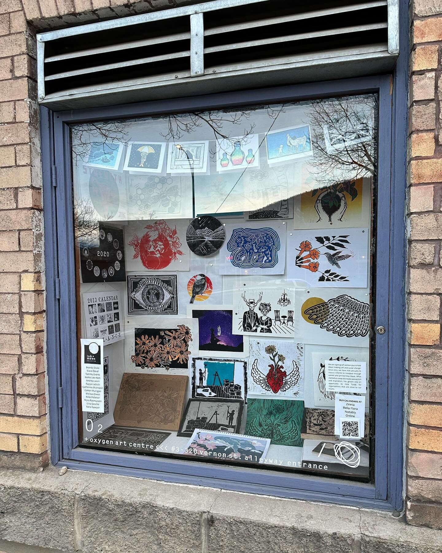 A decade of calendars for social change! A retrospective of @inkandmooncollective prints and blocks were recently featured in @oxygen.art.centre&rsquo;s awesome mini-gallery window. 

I&rsquo;ve been part of this group of like-minded, change-maker wo