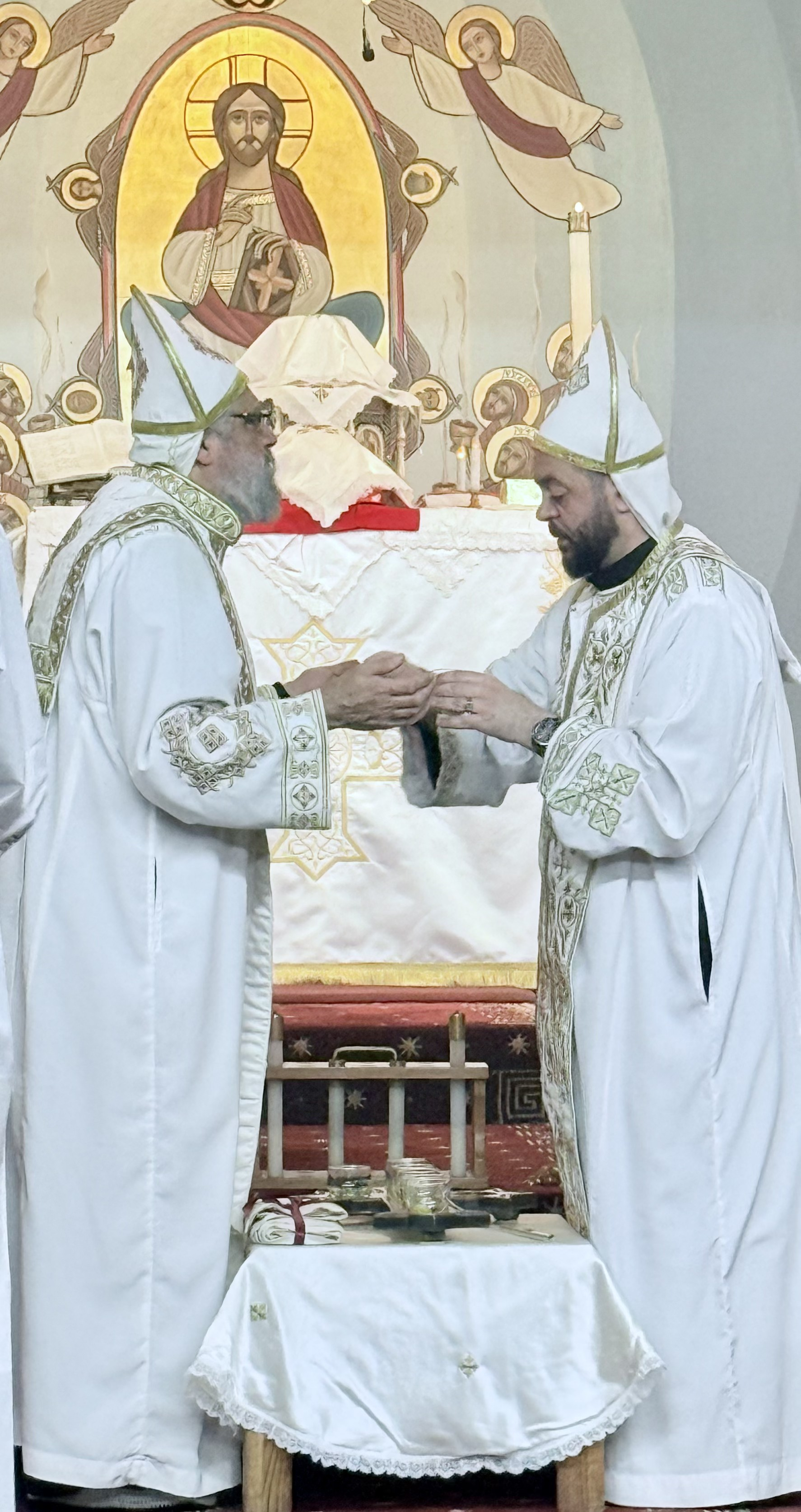 The COCC priests in front of the altar.