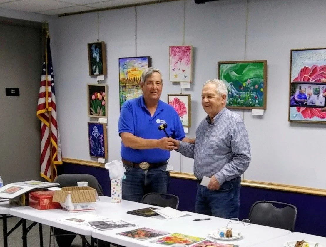 Handing off the gavel.jpg