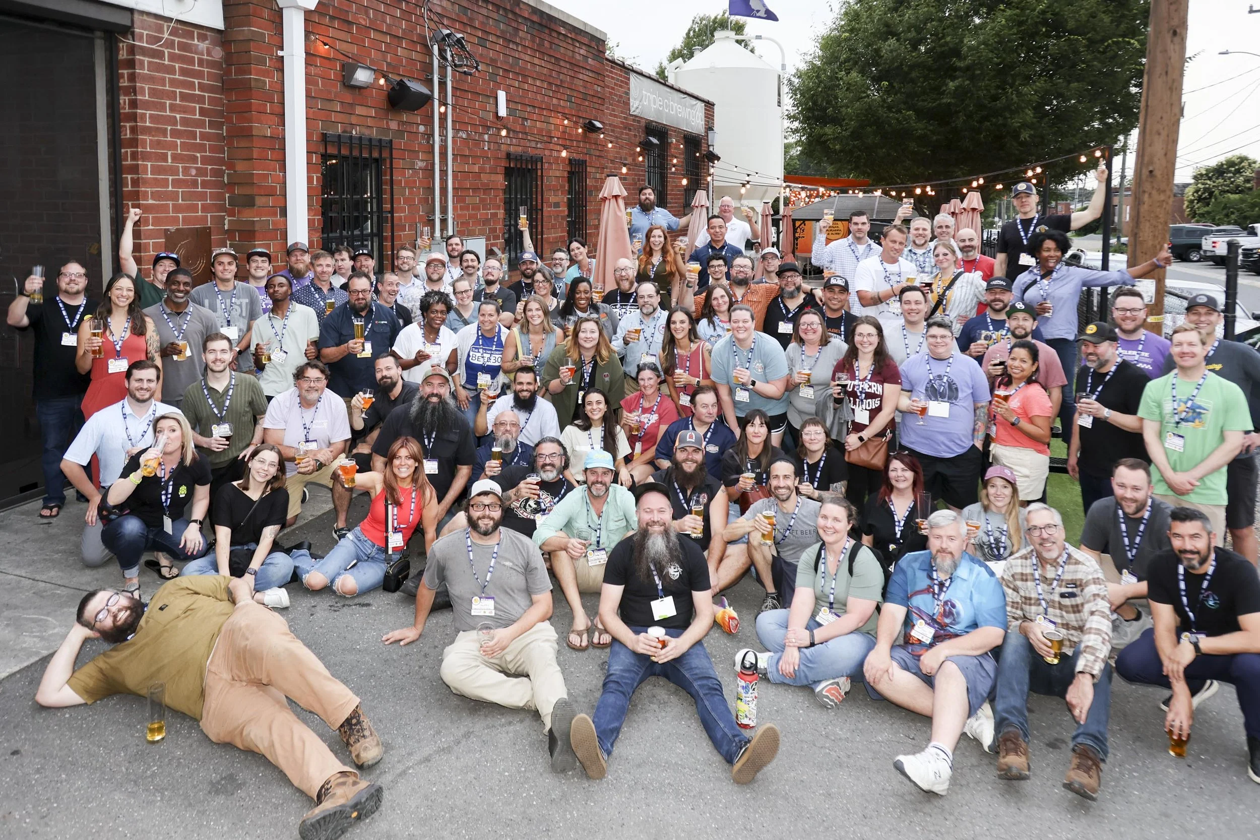 group of NC beer members outside of a brewery for a large group photo
