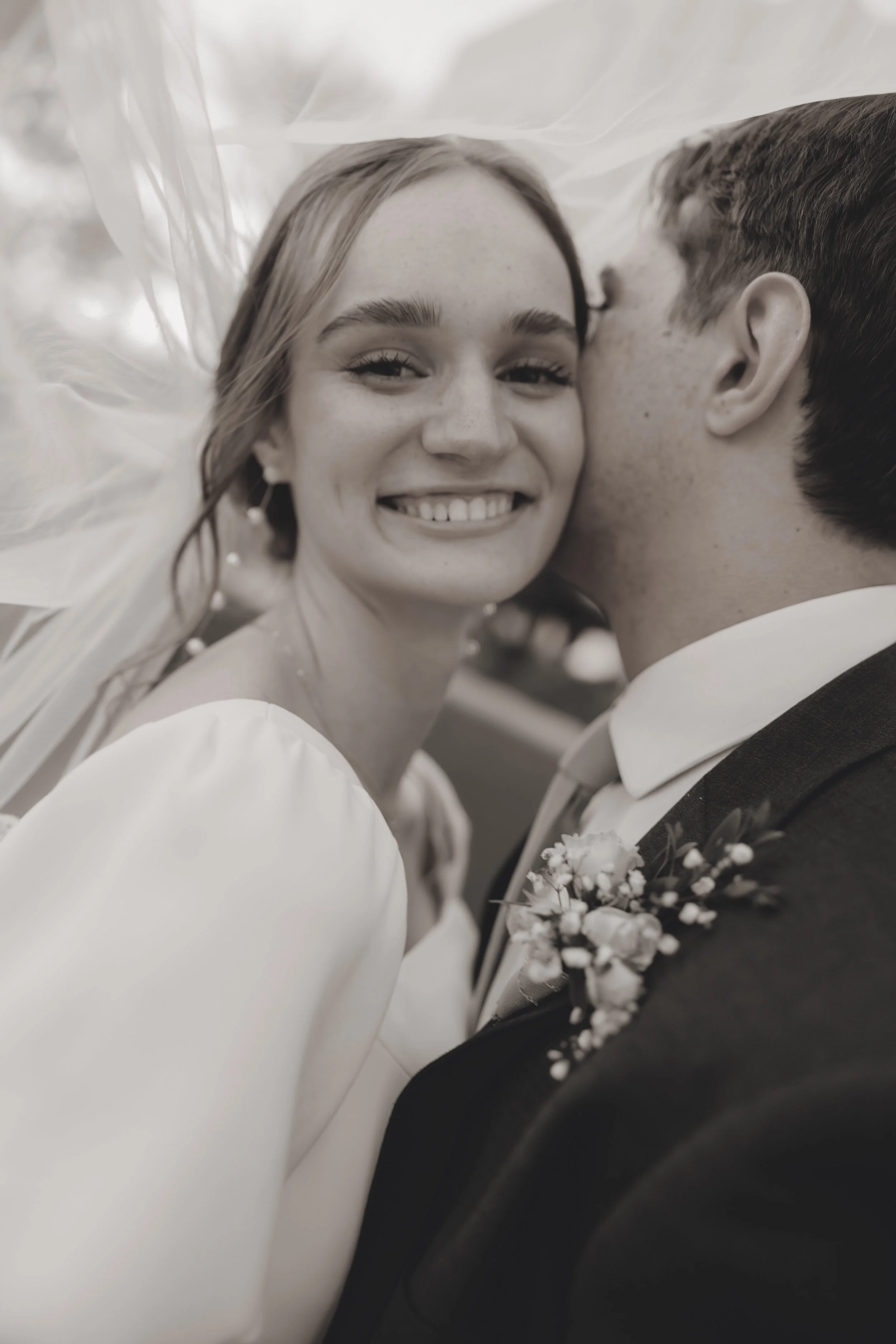 Bride and groom smiling during wedding