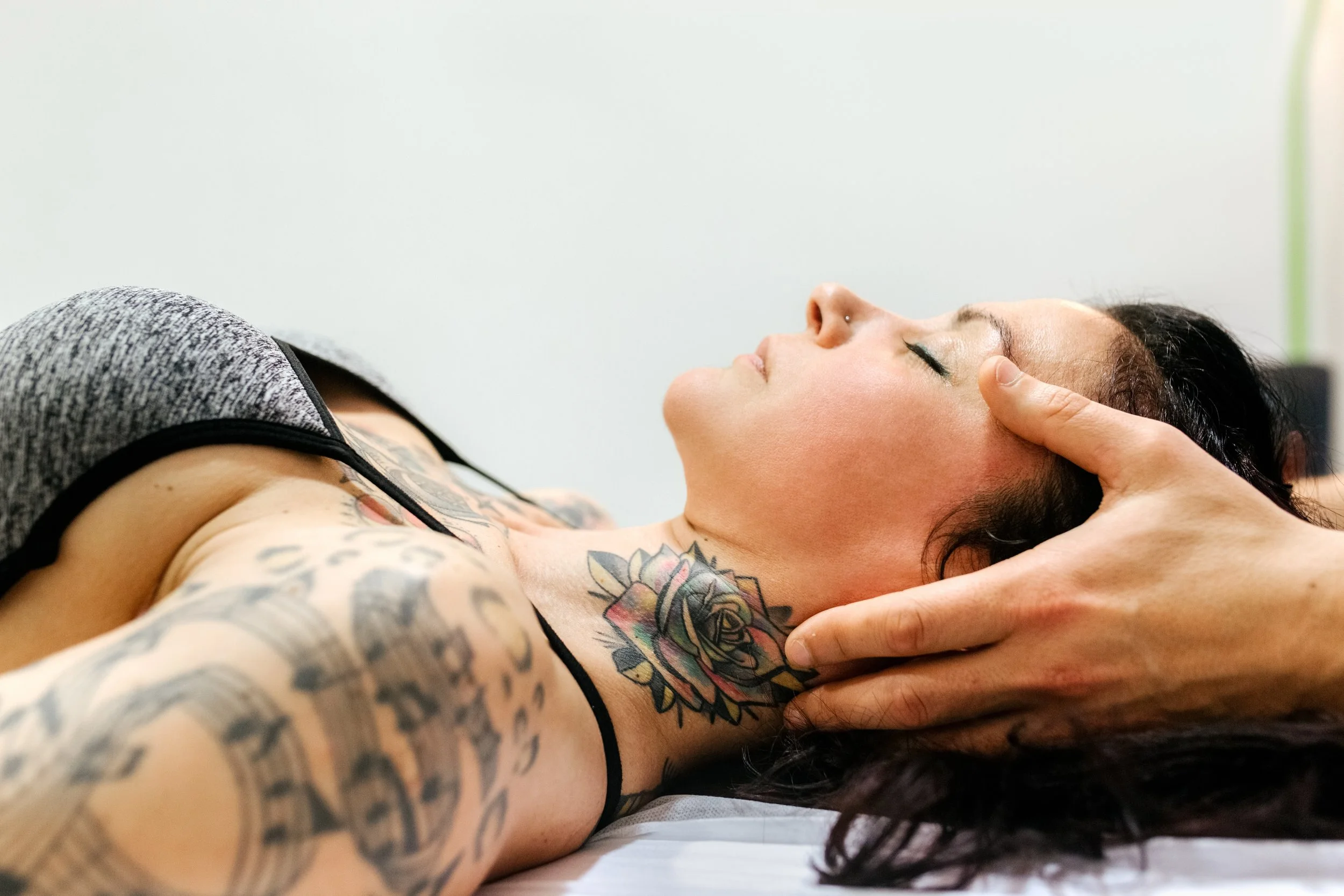 Woman receiving craniosacral treatment