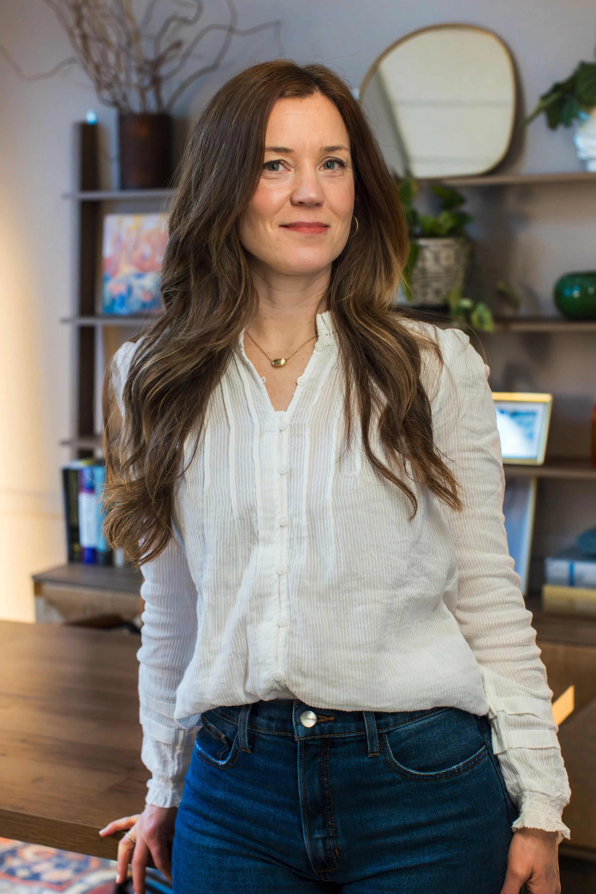 branding headshot of a woman in her office