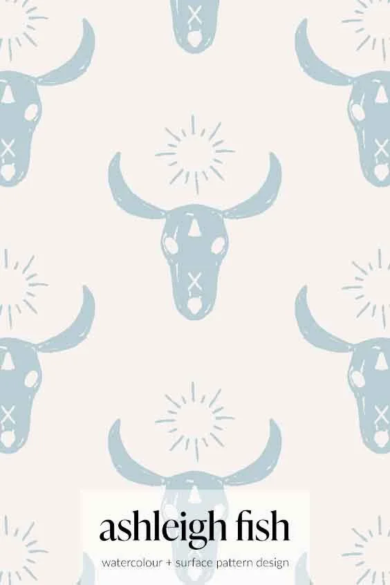 Pattern design featuring blue bull skulls and sun symbols with text "ashleigh fish, watercolour + surface pattern design."