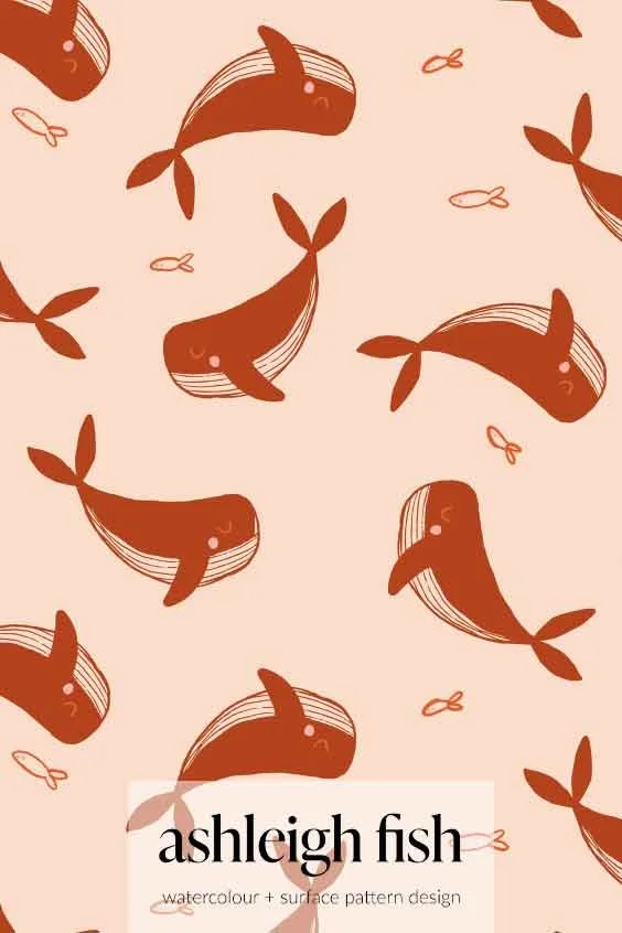 Illustrated pattern of brown whales on a beige background with small fish, labeled 'Ashleigh Fish Watercolor Surface Pattern Design.'