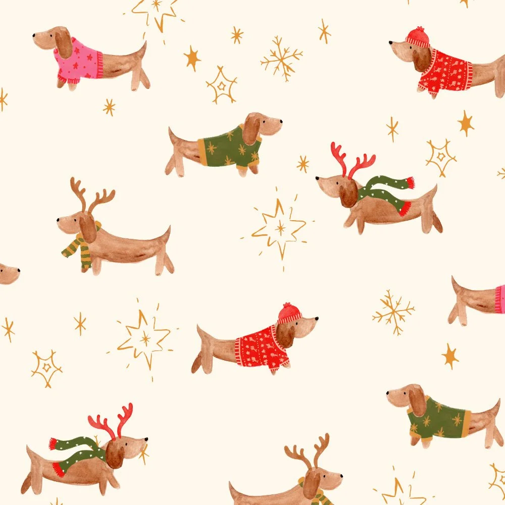 Pattern of dachshund dogs in Christmas attire with red and green sweaters, scarves, and reindeer antlers, surrounded by gold snowflakes and star shapes on a beige background.