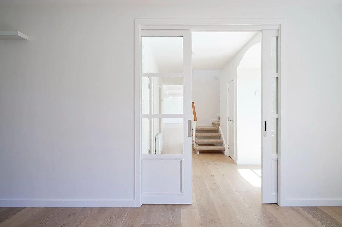 ✨South Yarra renovation
Taking out a dark poky hallway and adding these glass sliding pocket doors transformed the entry of this converted townhouse home (swipe for before photo).
Now the spaces are connected visually and you can look through into th