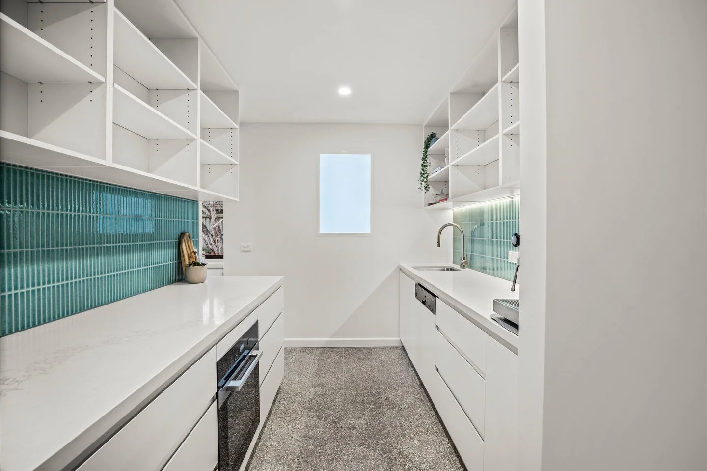 This stunning butler&rsquo;s pantry from our Hampton renovation is almost like a second kitchen for this family of five.
With a sink, second oven and dishwasher, plenty of bench space for a coffee machine and other appliances, drawers &amp; overhead 