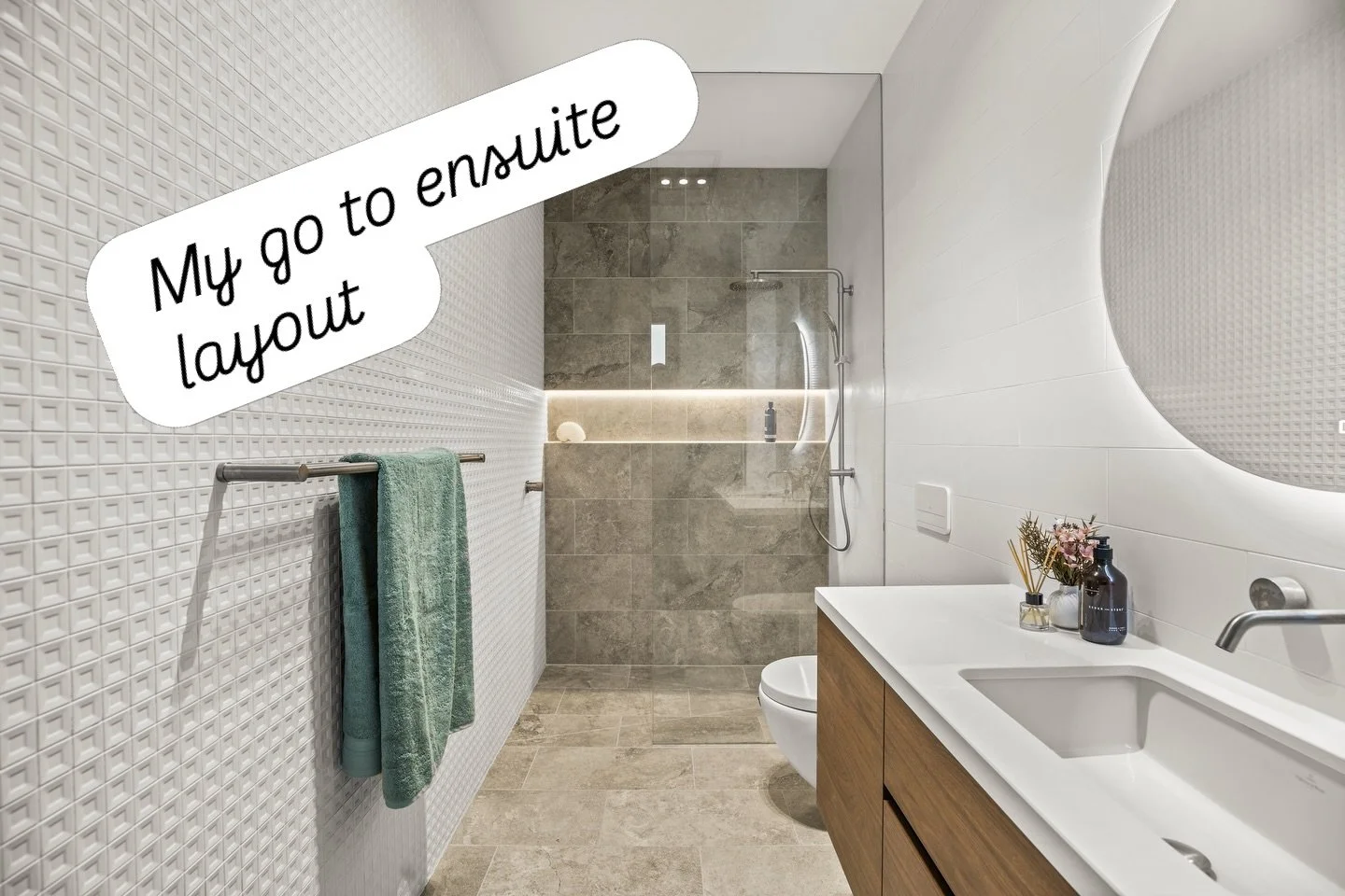 When it comes to designing an ensuite bathroom to fit in a narrow space there&rsquo;s really only one layout that works for me. 
With a walk-in shower across the end, toilet partly concealed by the vanity unit and a floating vanity this layout works 