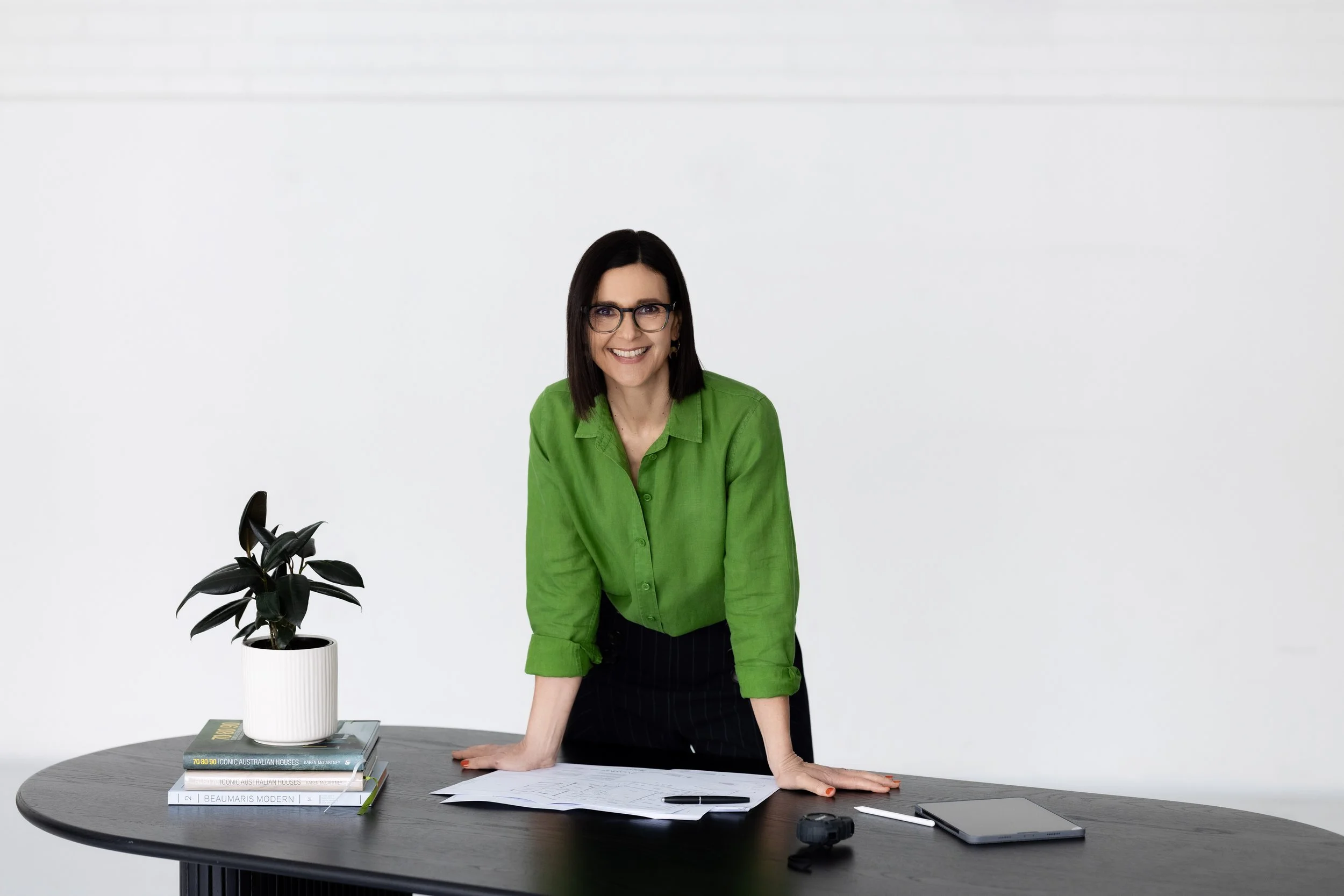 Architect at desk with drawings