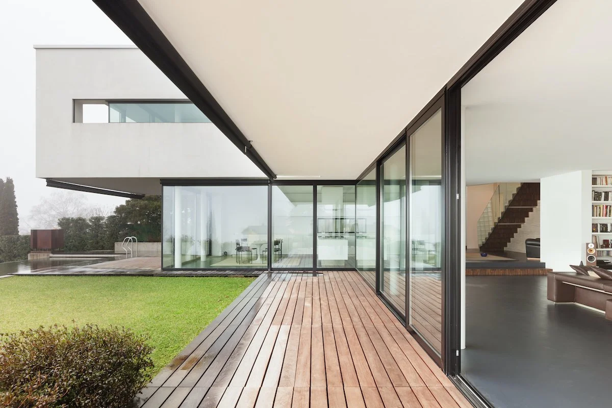 Modern home with large glass windows and doors suitable for professional EnduroShield coating