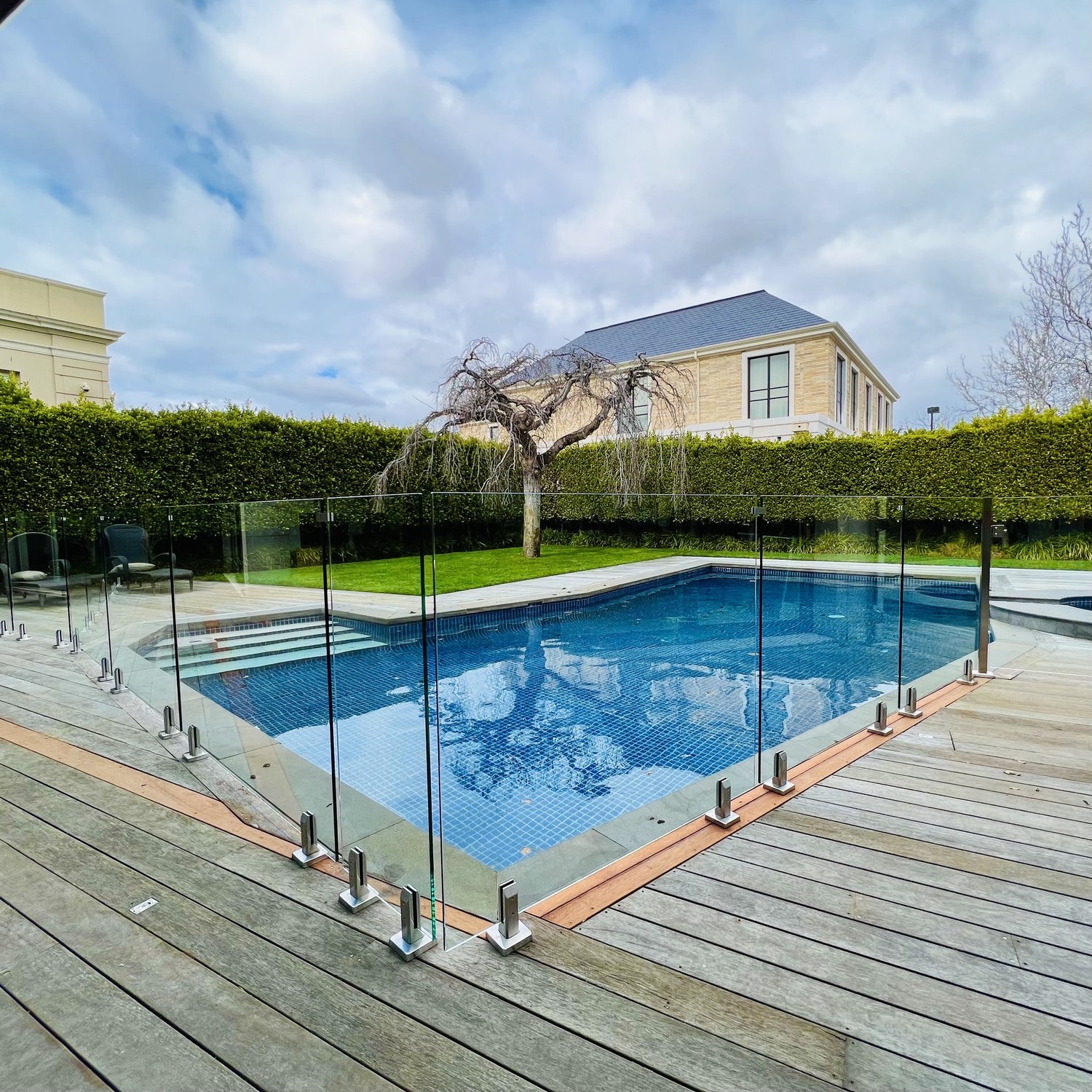 Clear glass pool fencing at a Melbourne residential property