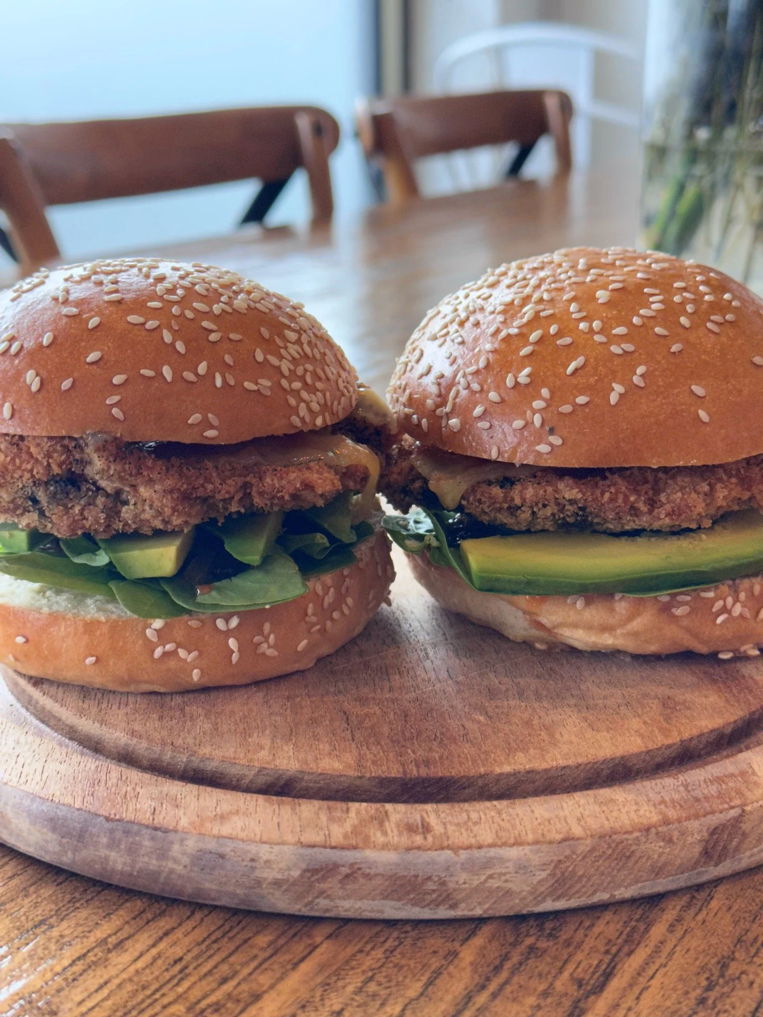 Vegetarian Breakfast Burger filled with a fried crumbed mushroom, cheese, avocado and spinach.