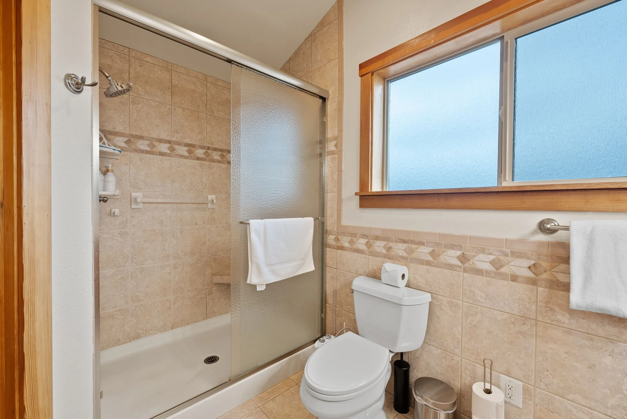 Extra large walk-in shower in upper level bathroom