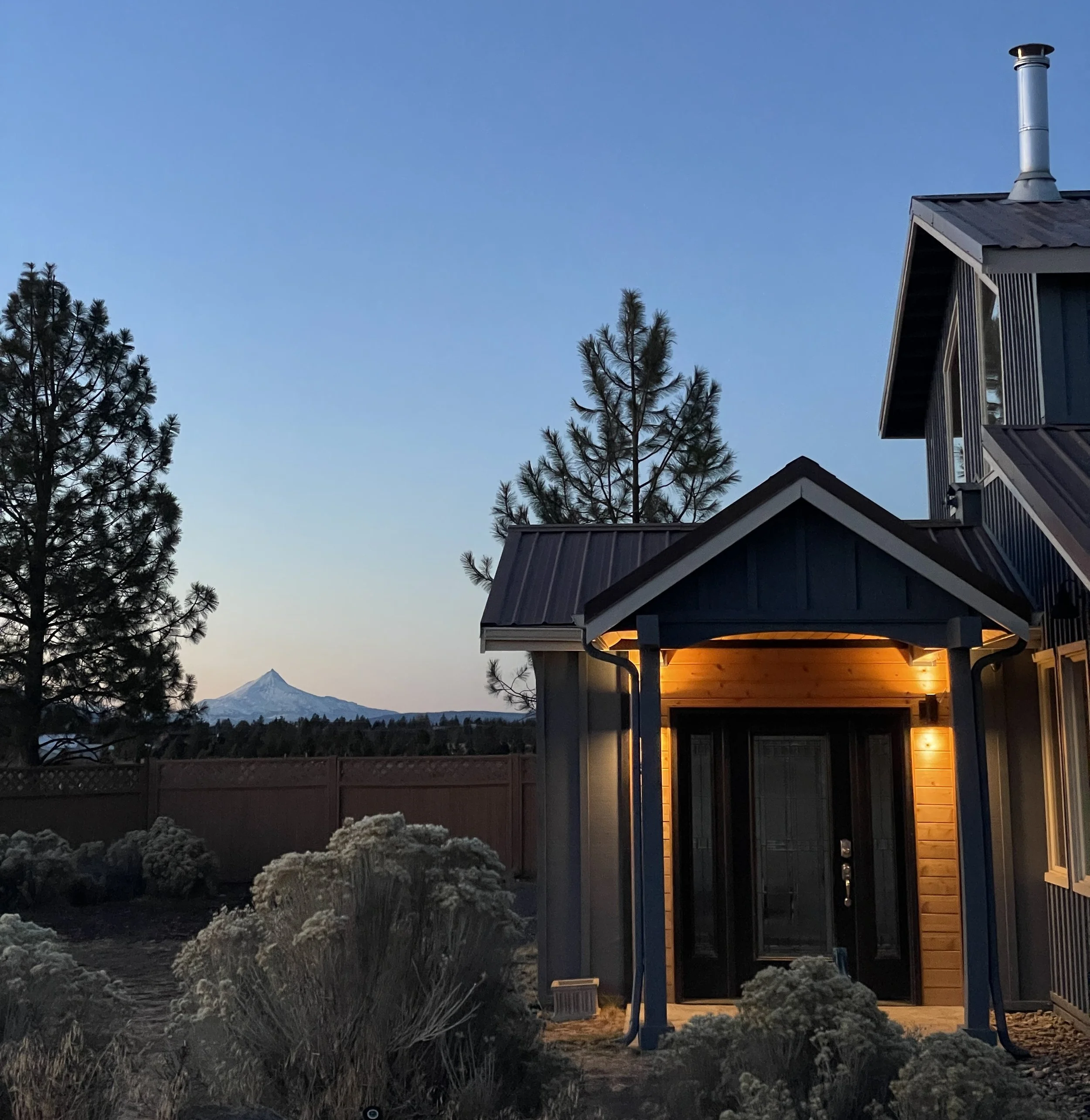 Image of entrance at Six Mountain View with Mt Jefferson in the background