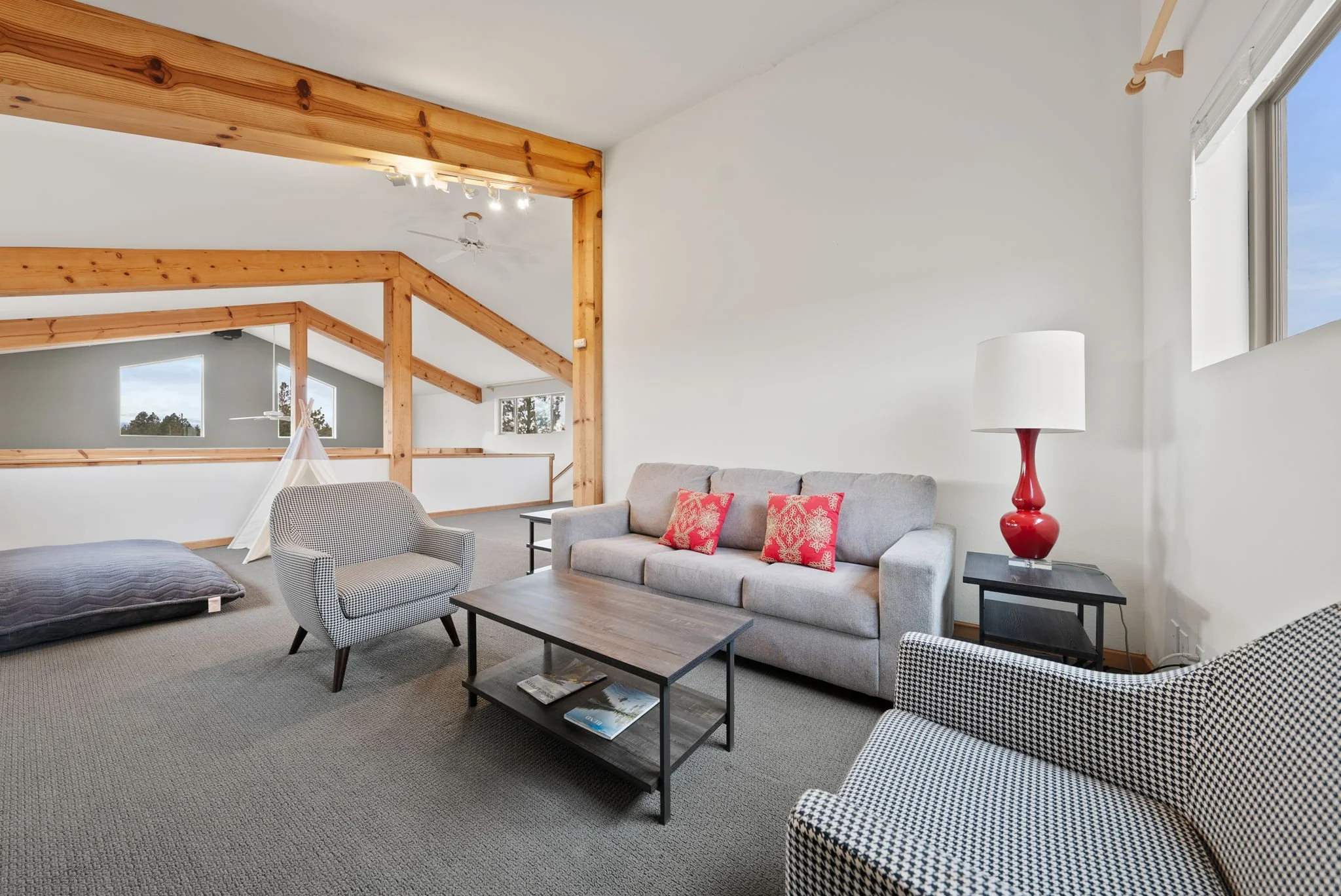 Photo of the seating area in the loft looking towards the stairs
