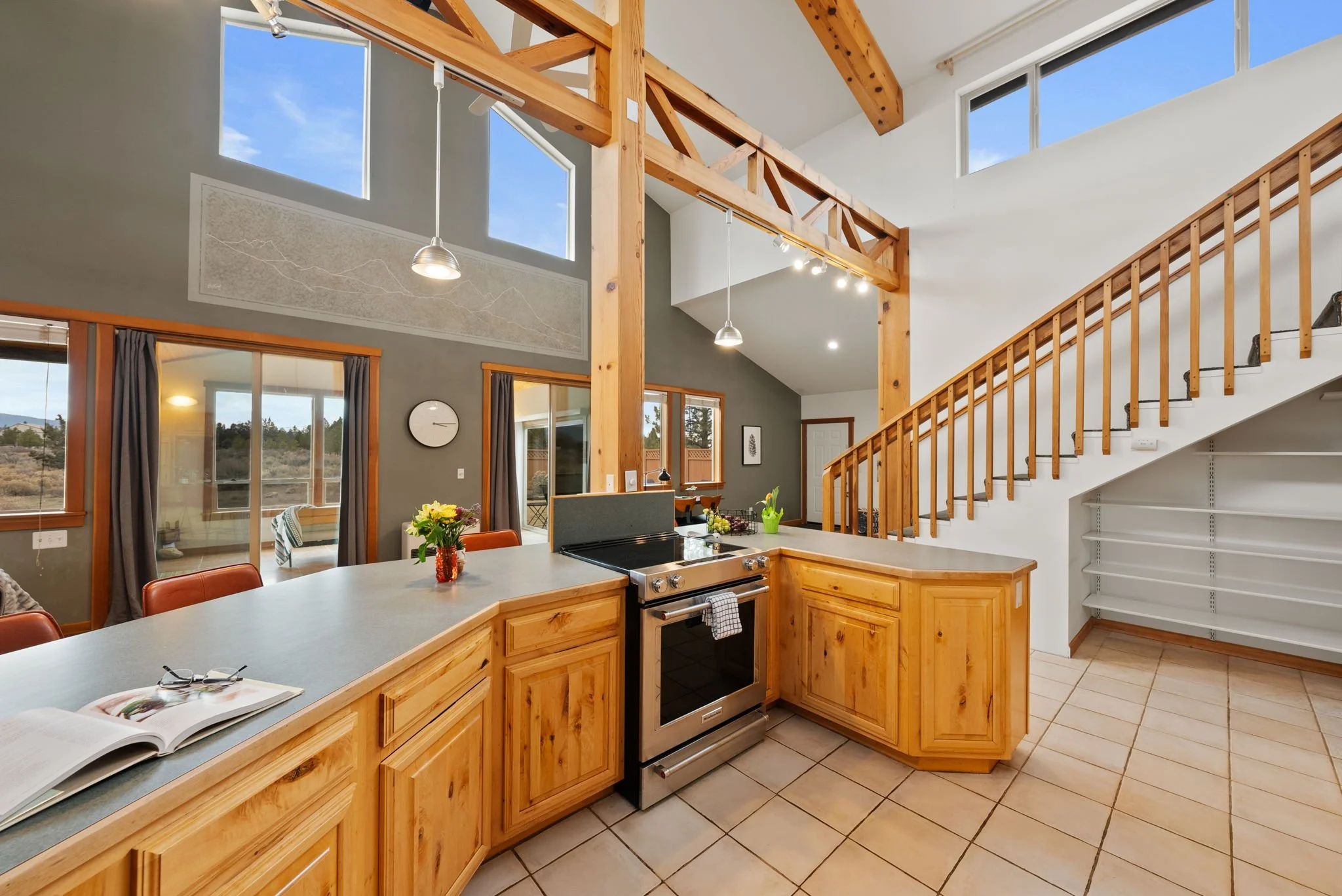 Photo of the kitchen looking towards the stairs to the loft