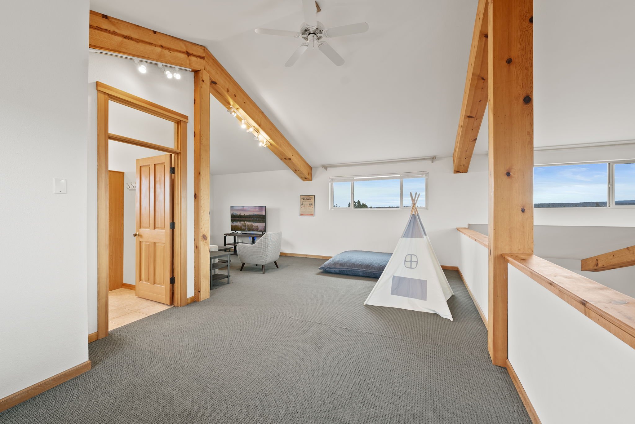 Kids tent and cushion in the loft at Six Mountain View