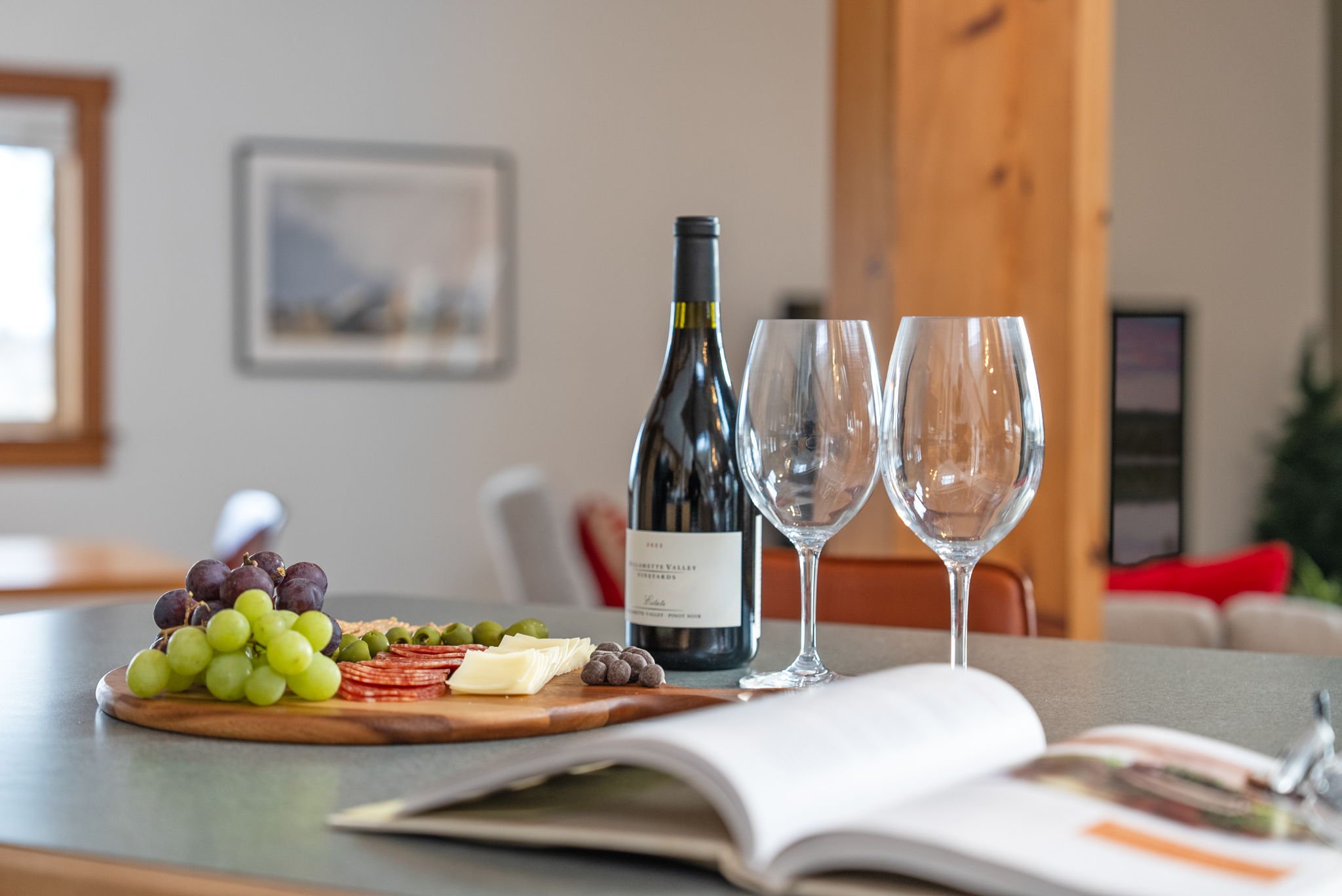 Image of wine and cheese on the kitchen counter at Six Mountain View
