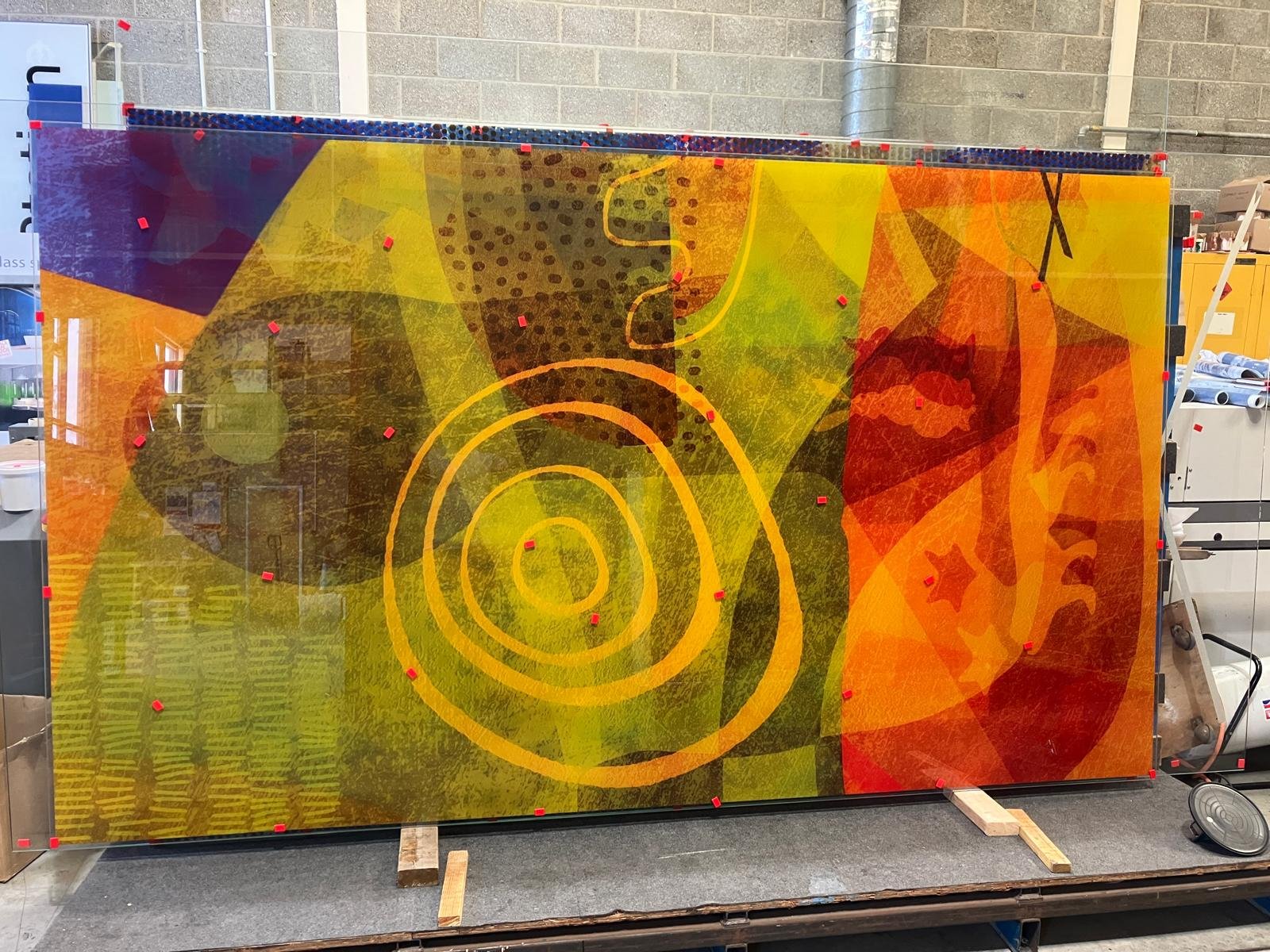 Screenprinted glass panels in production