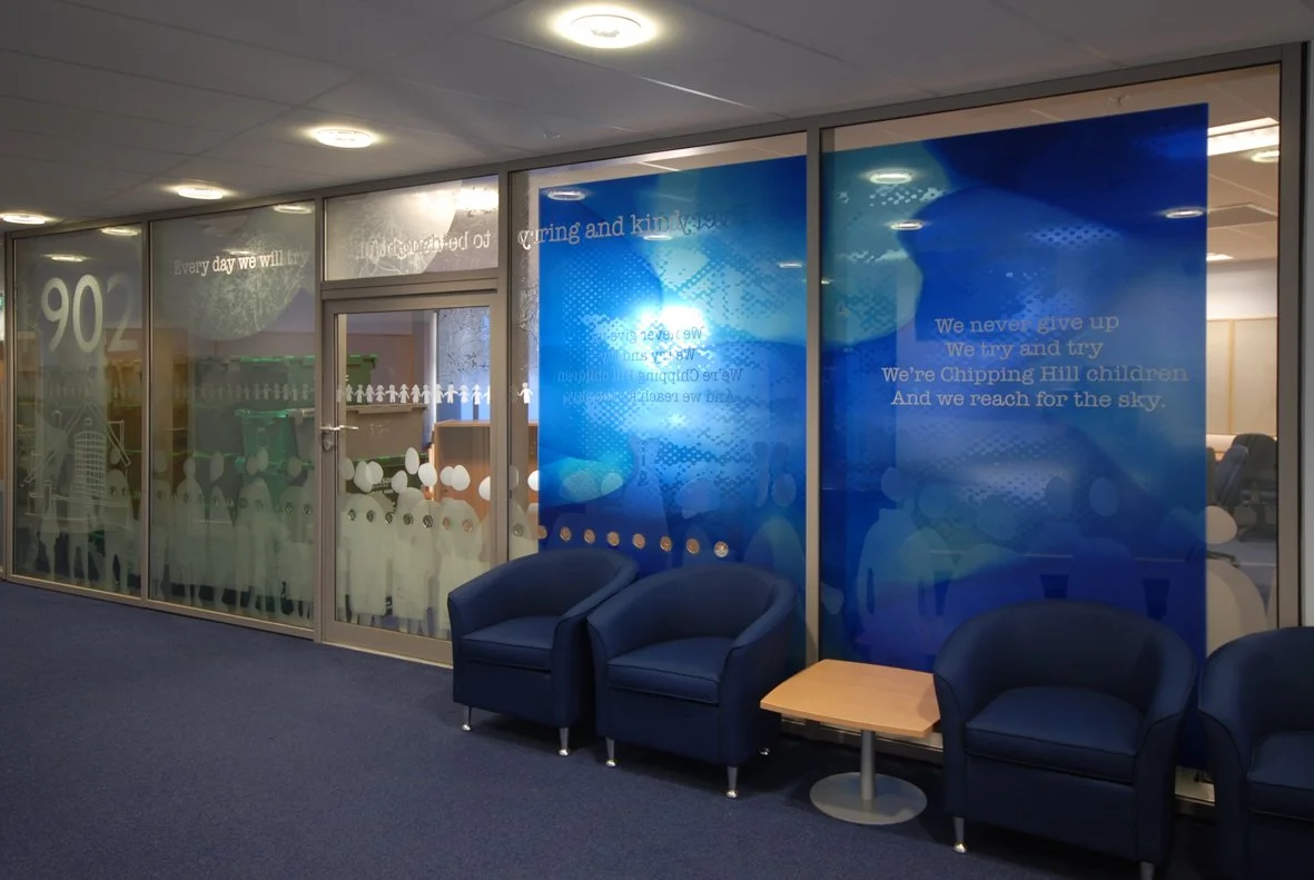 Chipping Hill primary school 3m x 9m glass screen acid-etched and painted with enamels