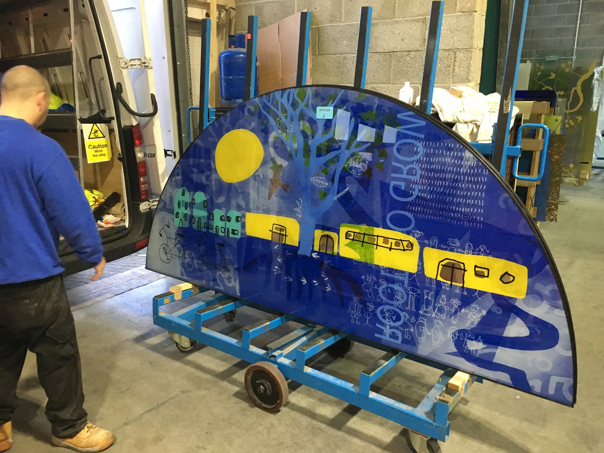 Stained glass curved window for Newnham Croft Primary School by Martin Donlin.