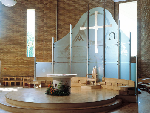 Modern church alter acid etched and curved screen.