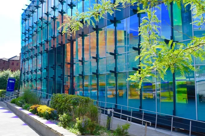 Architectural 18m tall dichroic glass fins, Sovereign House, Leeds