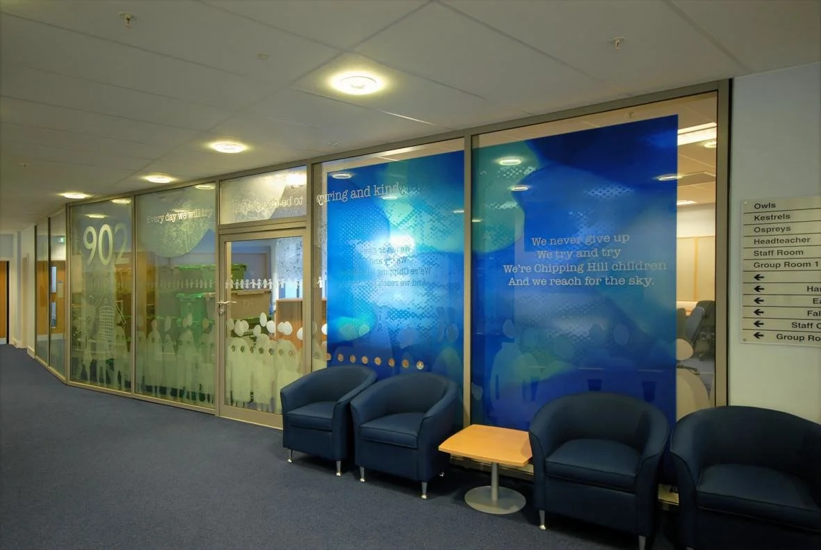 cid etched and hand painted enamel screen 9 metres wide x 3 metres high designed by Martin Donlin.