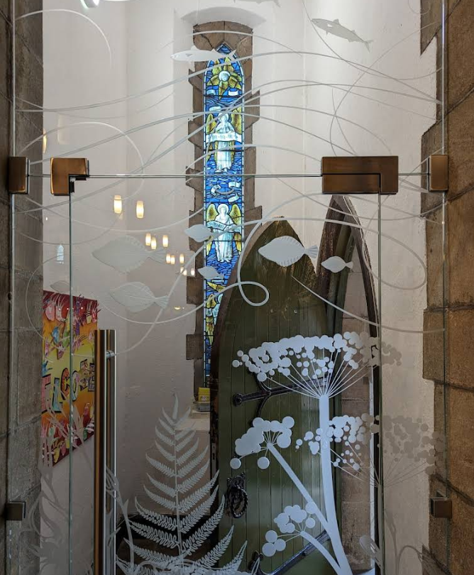 Etched glass doors at Morecambe Parish Church, designed by Sarah Galloway. 