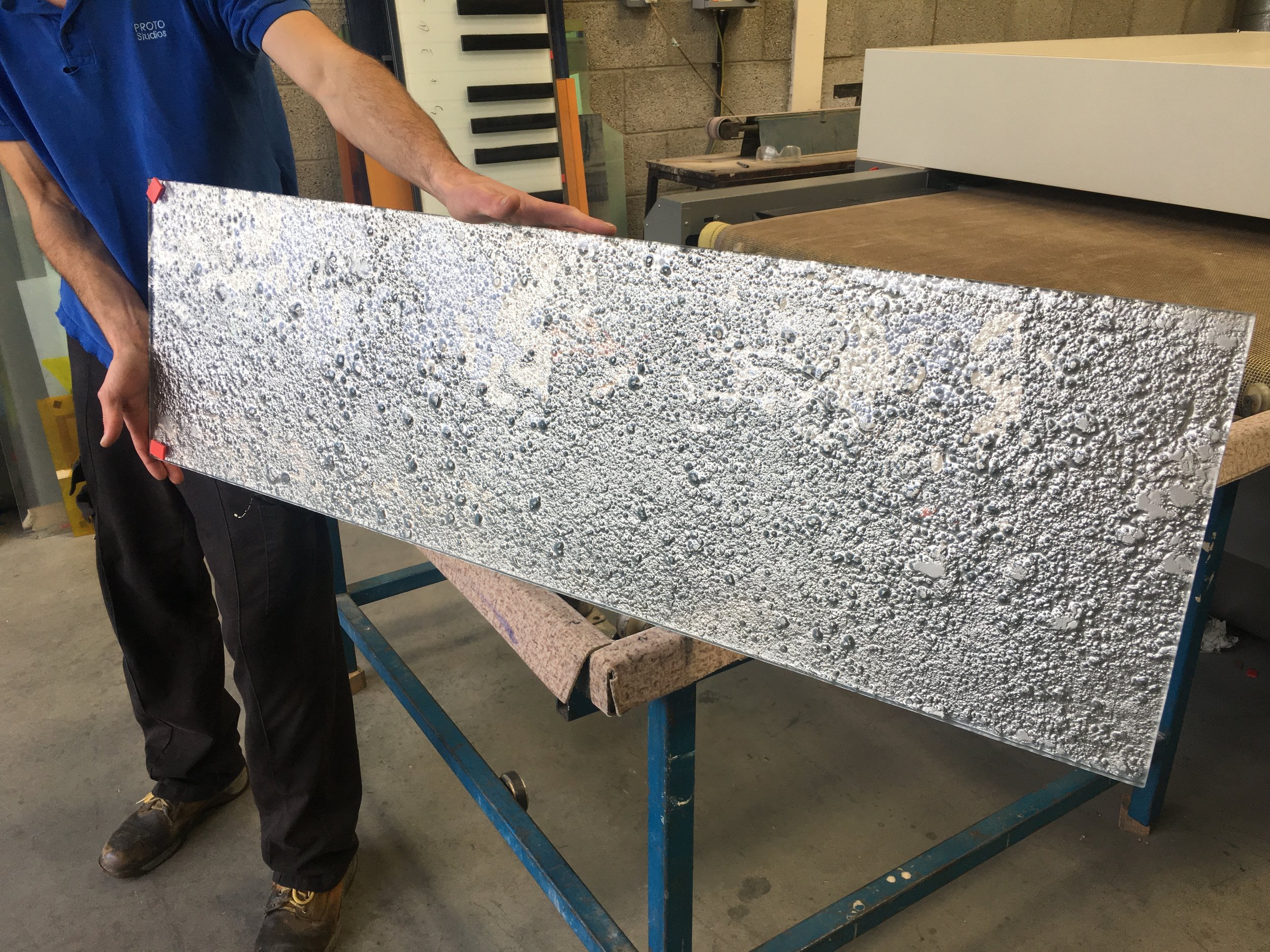 slumped metallic glass