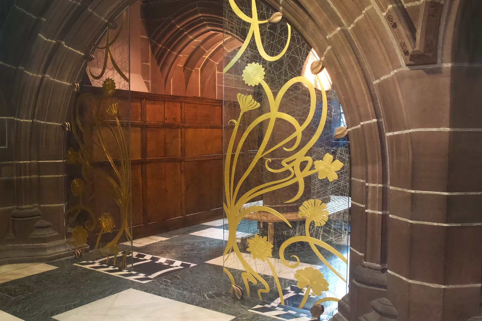 Lady Chapel Liverpool Anglican Cathedral. 24ct gold leaf and etched doorway with gold and silver reflective strands