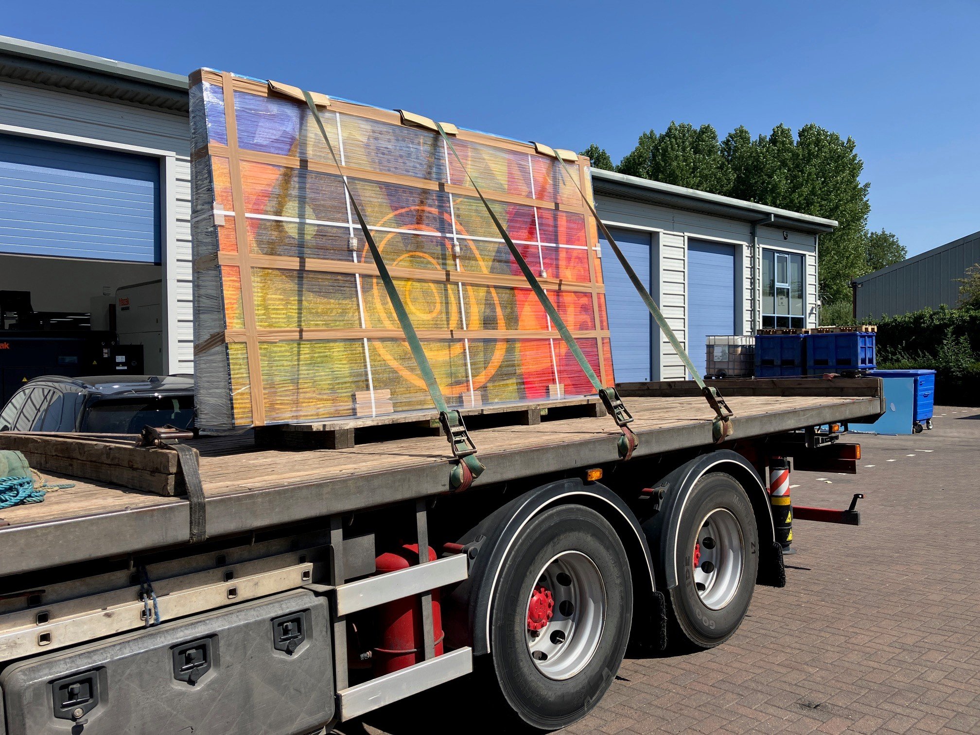 Screenprinted glass panels in transit