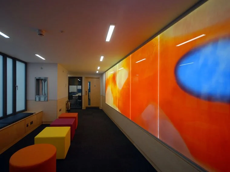 Light boxes at St Clare's Oxford designed by Martin Donlin in screen printed enamels.