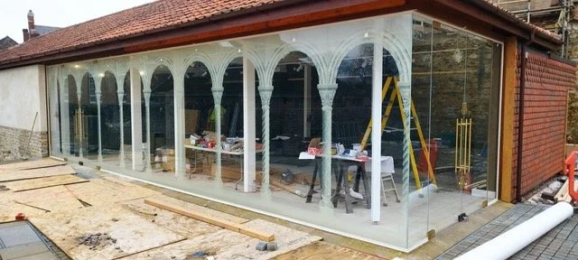 Glastonbury Abbey refurbishment. Screenprinted windows with a gradated tonal etch