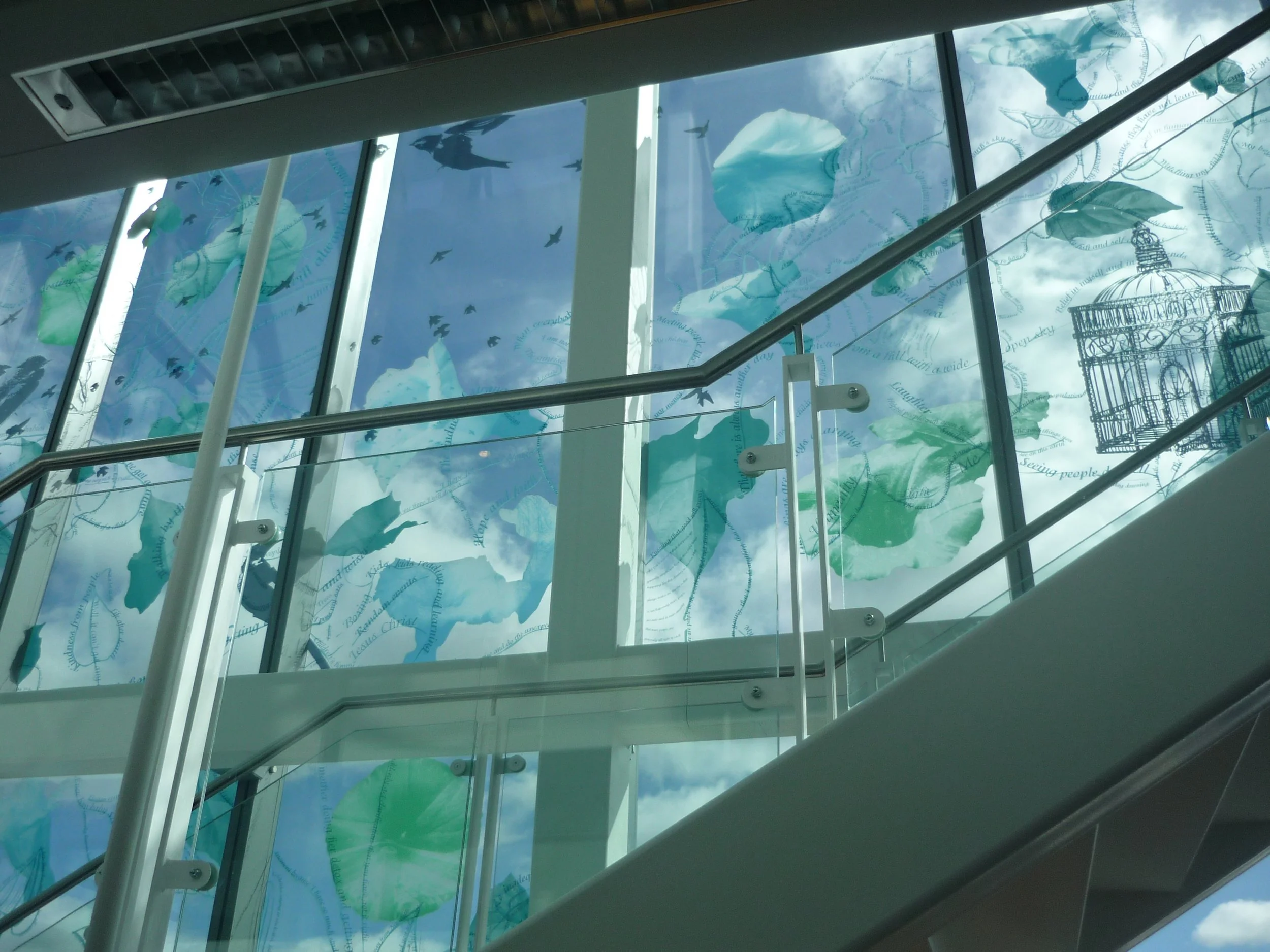 Newcastle Library glass facade featuring a design by Kathryn Hodgkinson 1500 sqaure metres of new generation temperable solar control glass.