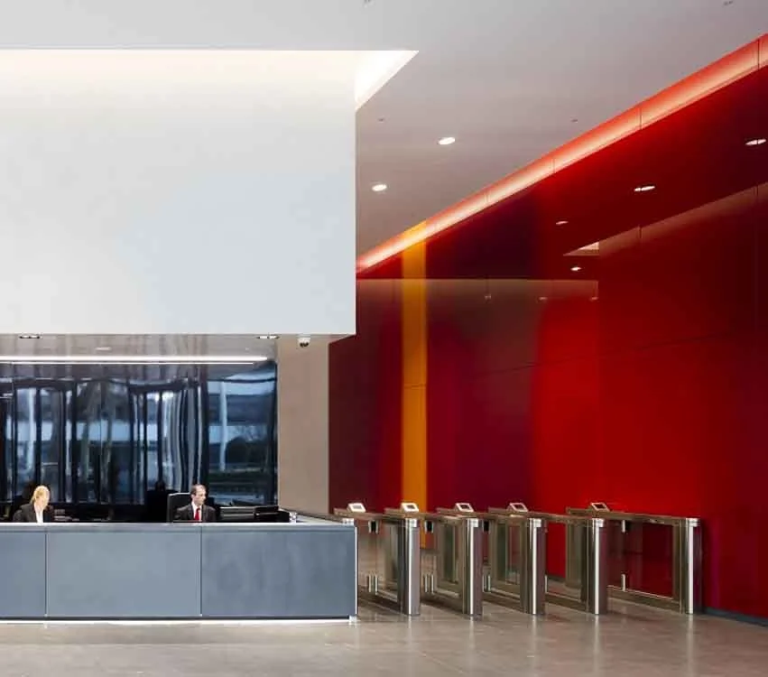 12 Hammersmith Grove, London, UK. Reception with decorative glass wall cladding