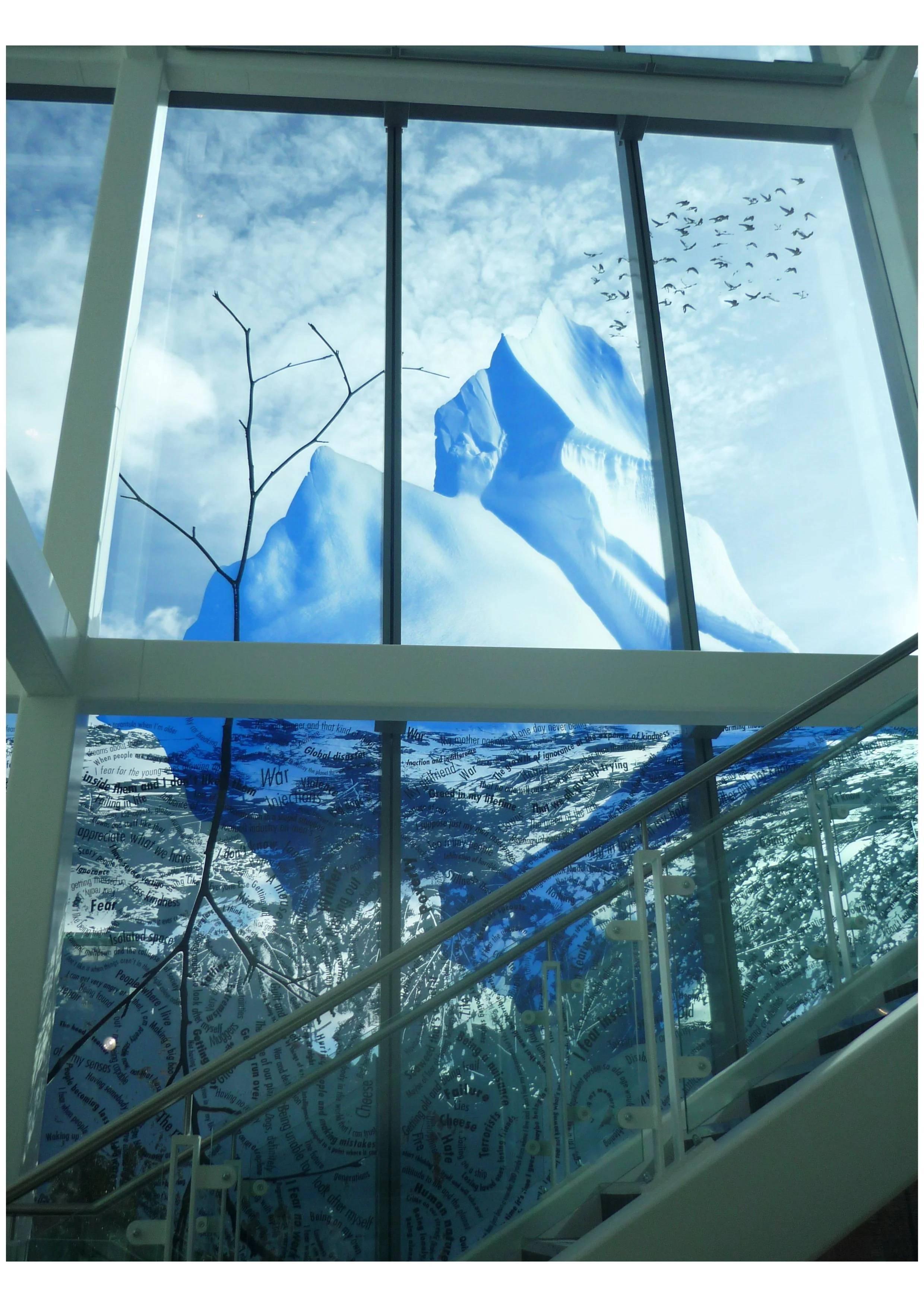 Large-scale architectural glass at Newcastle library featuring a vast, screen-printed design covering the façade.