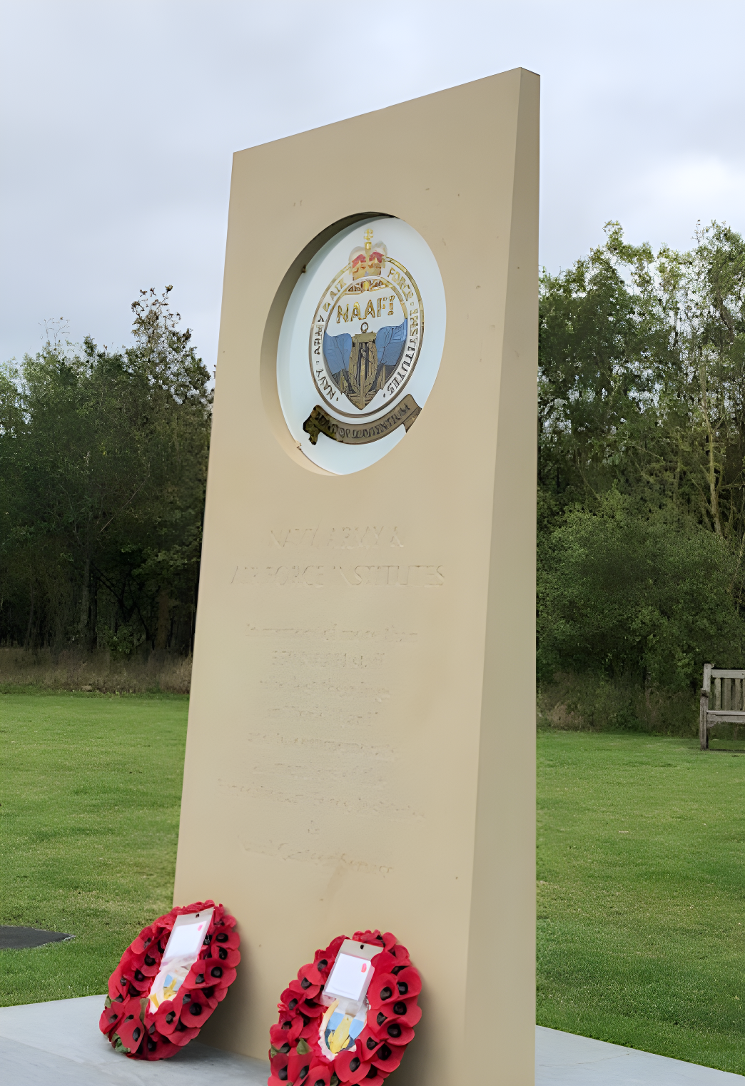 The Naafi (Navy, Army and Airforce Institutes) memorial by Graeme Mitcheson, screenprinted and gilded glass circle