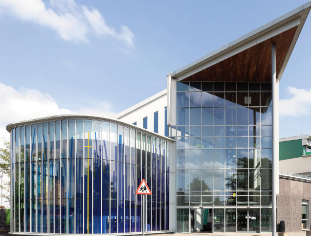 Opaque screenprinted design to modern chapel facade.