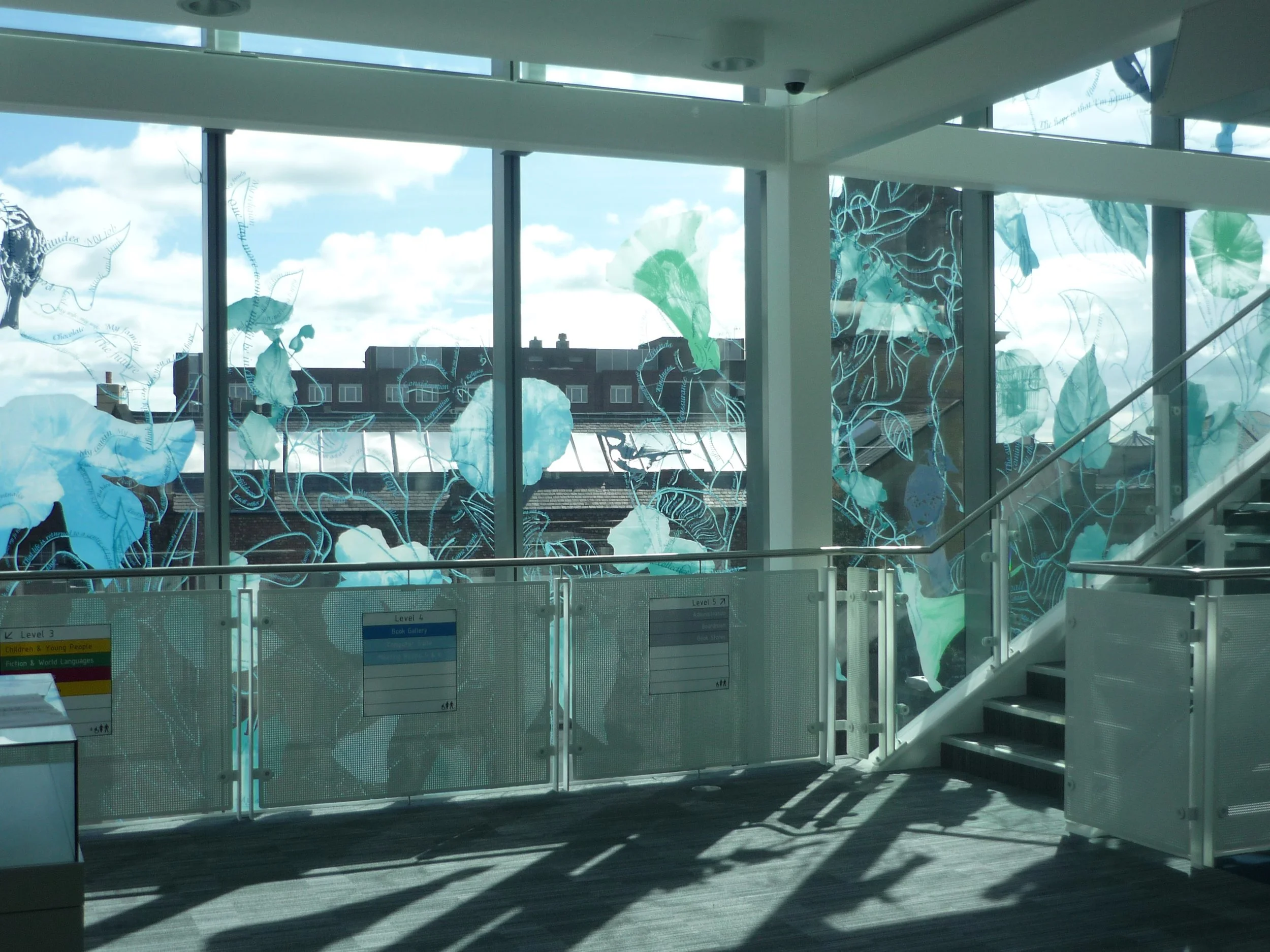 An image of the face of Newcastle City Library with screen printed ceramic frit design