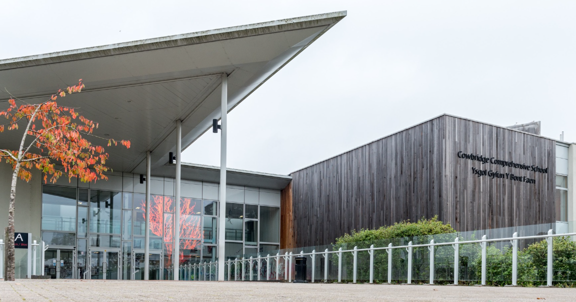 Cowbridge school glass entrance Dichroic & Metamark films, laminated in double-glazed units designed by Catrin Jones.