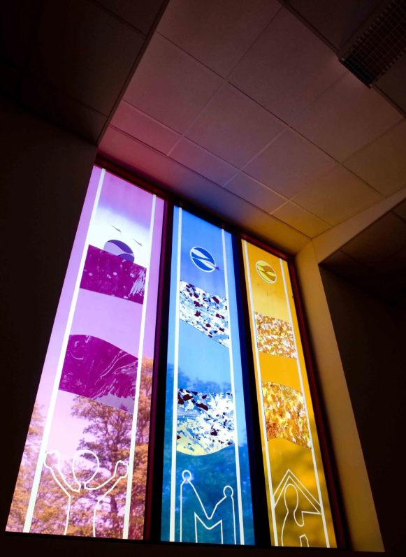 Three enamelled glass coloured panels at The Macintyre School.