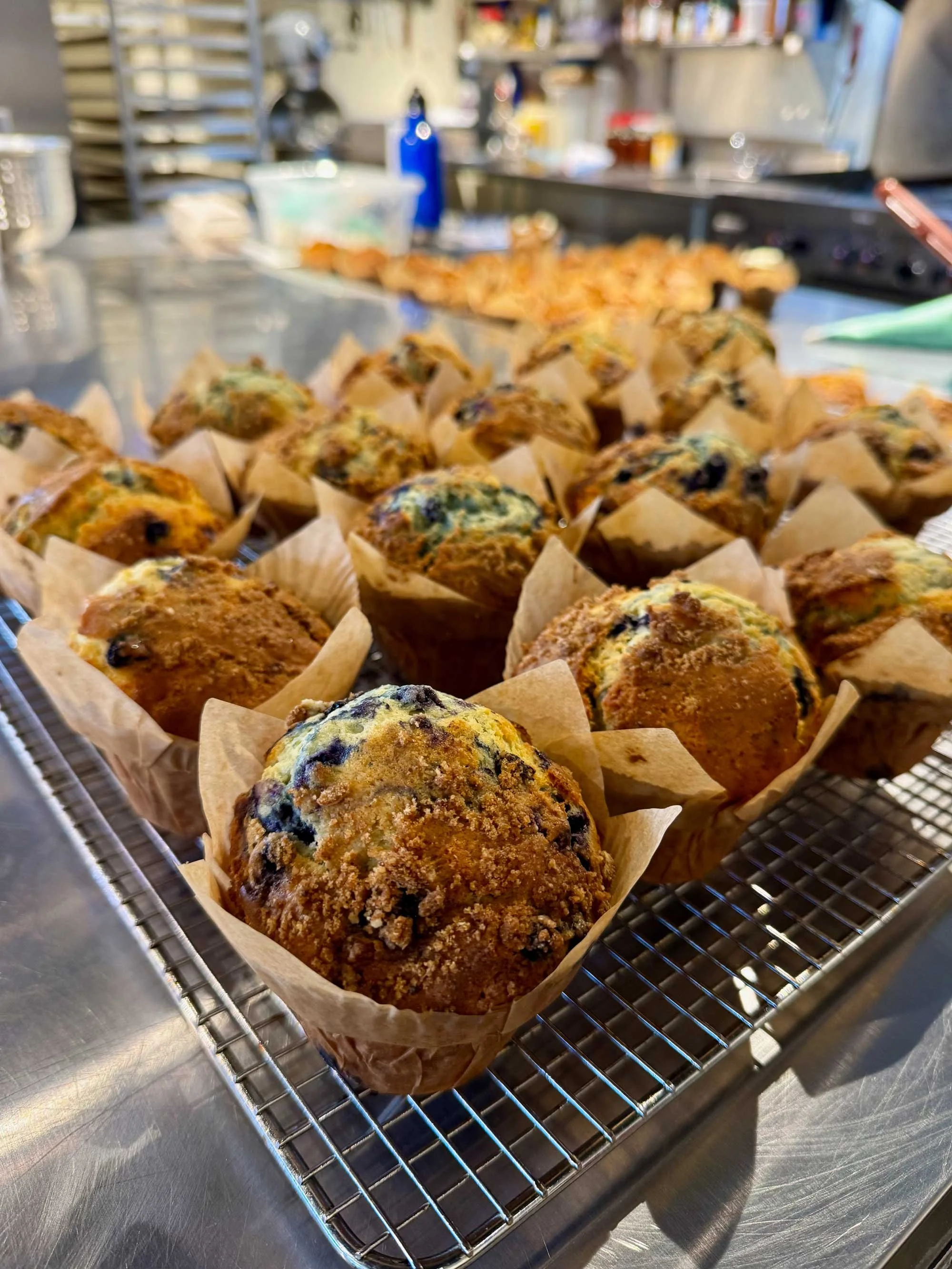 Freshly baked muffins cooling in the kitchen at Red Shirt Farm Market, Lanesborough, MA
